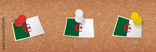 Algeria flag pinned in cork board, three versions of Algeria flag.