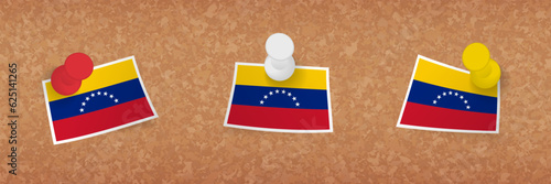 Venezuela flag pinned in cork board, three versions of Venezuela flag.