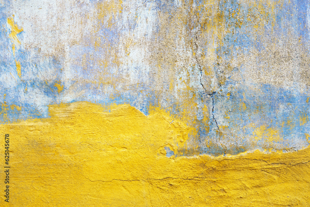 Cracked stucco blue yellow background, weathered faded wall texture Cracked stucco blue yellow background, weathered faded wall texture