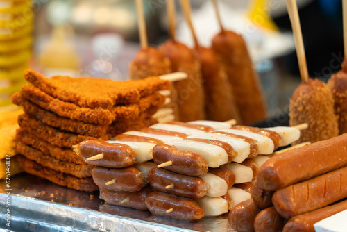 Delicious Korean cuisine Tteokbokki, spicy rice cake in market, street food. photo