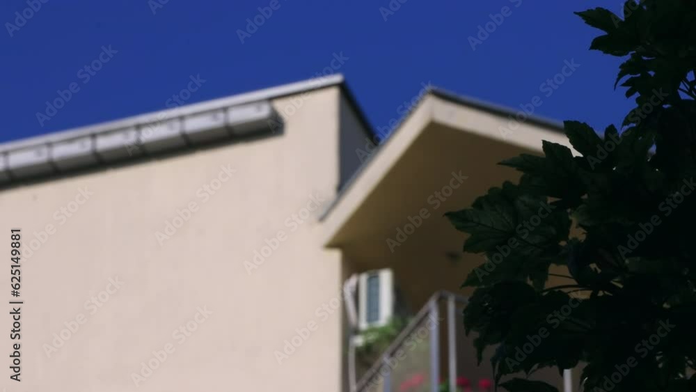 Nest boxes for Swifts ( Apus apus ) hung on the wall of an apartment building, tongues fight mosquitoes and other insects, ecological and natural methods of combating nuisance insects in the city.