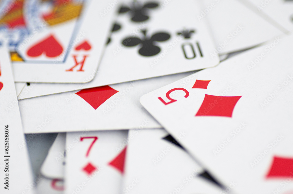 Intricate playing cards scattered on the table. Intricate playing cards scattered on the table.