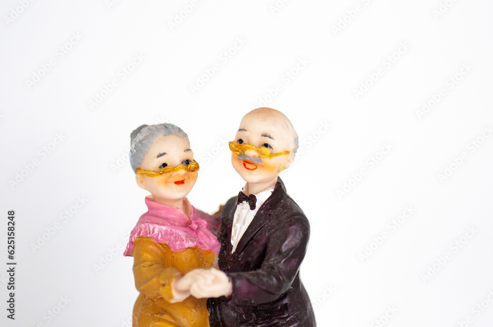 Elderly couple statuette on a white background Elderly couple statuette on a white background