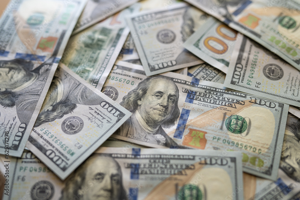 Texture of dollar bills. One hundred dollars. Close-up. Texture of dollar bills. One hundred dollars. Close-up.