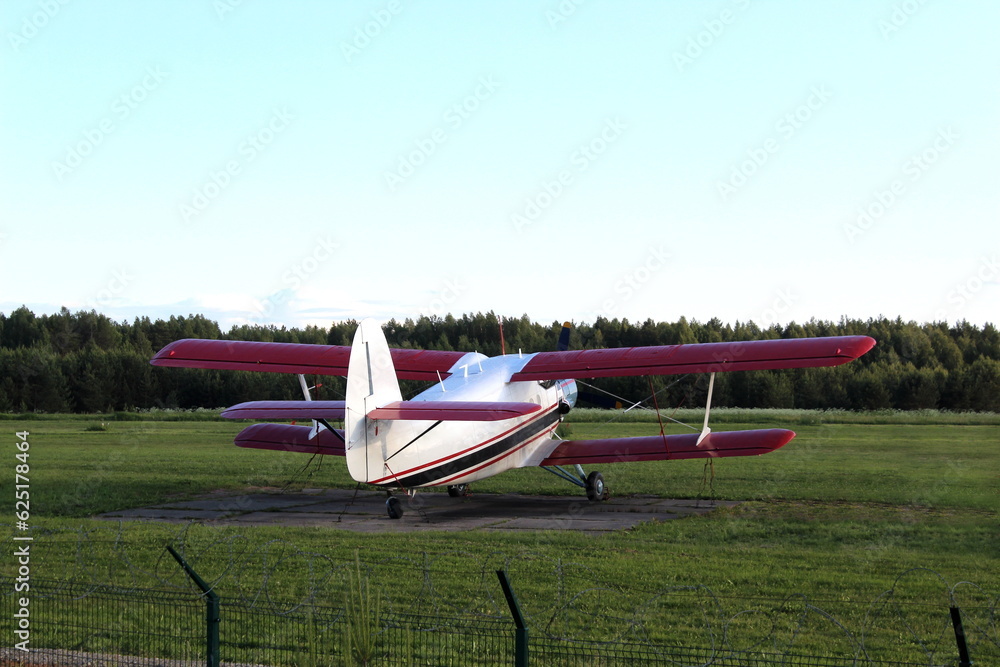 There is a small plane in a field. There is a small plane in a field.