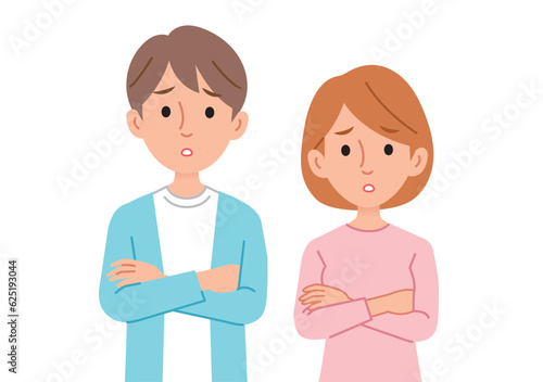 Men and women who are worried while folding their arms