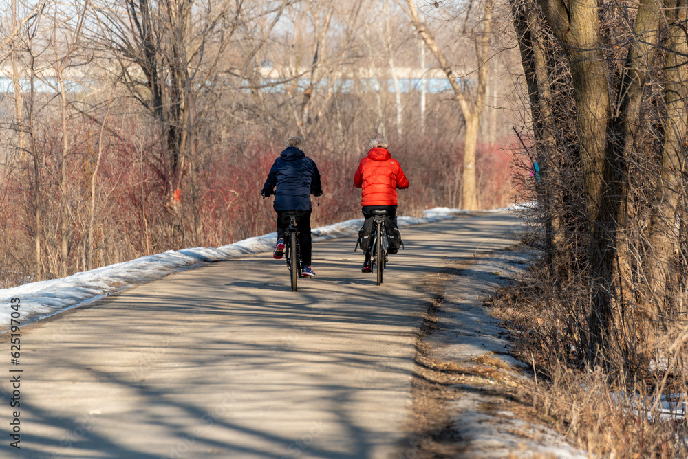 People Enjoying The Fox River Trail Near De Pere, Wisconsin, In Mid-February People Enjoying The Fox River Trail Near De Pere, Wisconsin, In Mid-February