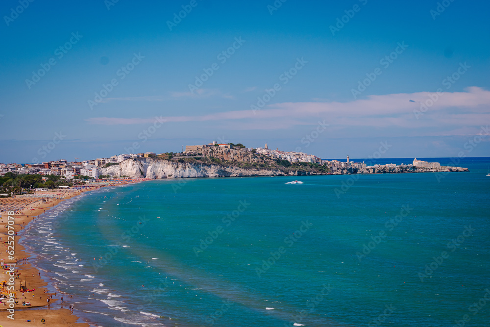 Vieste In Puglia, the long beach and the Pizzomunno monolith.