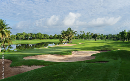 Golf Course Sand Pit Bunkers, green grass surrounding the beautiful sand holes is one of the most challenging obstacles for golfers and adds to the beauty of the golf course.