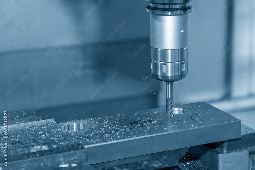 The CNC milling machine cutting press part with ball end mill tool. The CNC milling machine cutting press part with ball end mill tool.