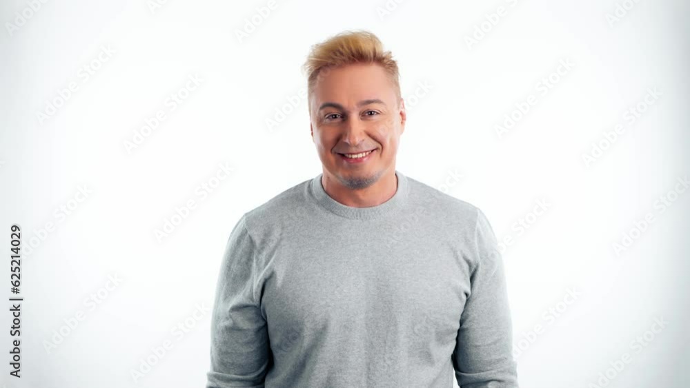 Comical funky man making fun silly facial expressions, fooling around. Caricature humor emotion and excited comic guy for good mood and positive feeling in studio isolated on white background Comical funky man making fun silly facial expressions, fooling around. Caricature humor emotion and excited comic guy for good mood and positive feeling in studio isolated on white background