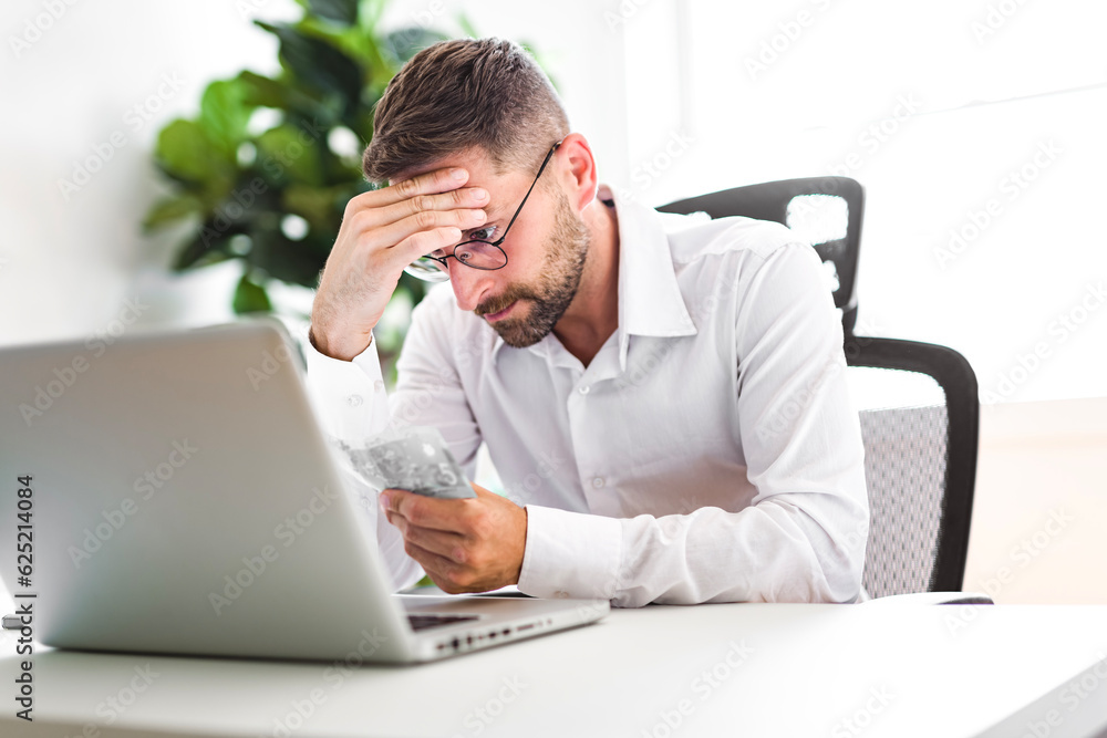 Mature business man using laptop computer in office. Mature business man using laptop computer in office.