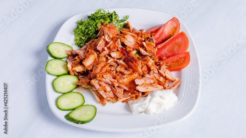 Chicken portion doner kebab in plate top view