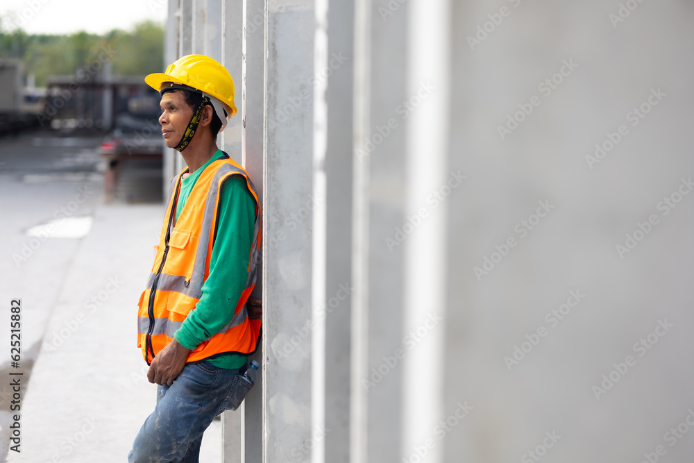 Portrait Asian professional Engineer factory. Engineering worker in safety hardhat at factory industrial facilities. Heavy Industry Manufacturing Factory. Prefabricated concrete walls Portrait Asian professional Engineer factory. Engineering worker in safety hardhat at factory industrial facilities. Heavy Industry Manufacturing Factory. Prefabricated concrete walls