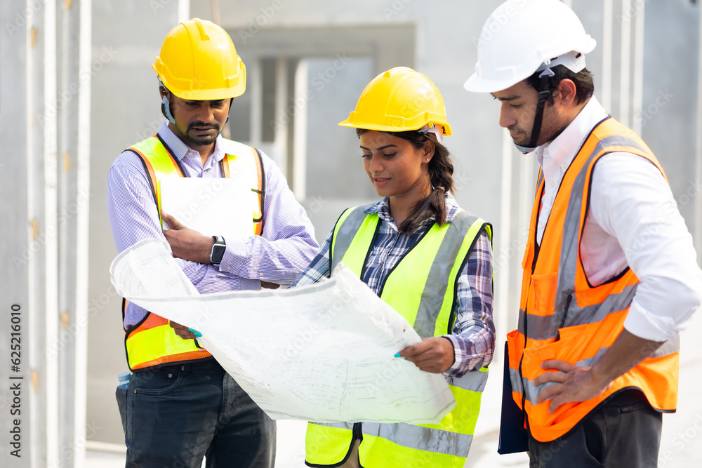 Professional Mechanical Engineer team Working on construction blueprints paper at Prefabricated concrete factory Heavy industrial. Product quality Inspection. Unity and teamwork concept Professional Mechanical Engineer team Working on construction blueprints paper at Prefabricated concrete factory Heavy industrial. Product quality Inspection. Unity and teamwork concept
