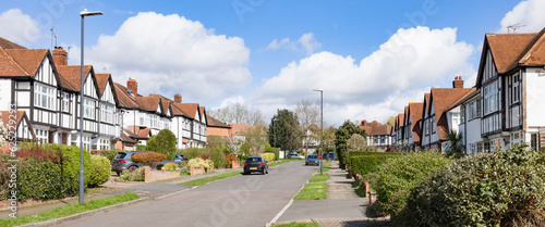 Semi-detached houses on a suburban street in London, UK photo