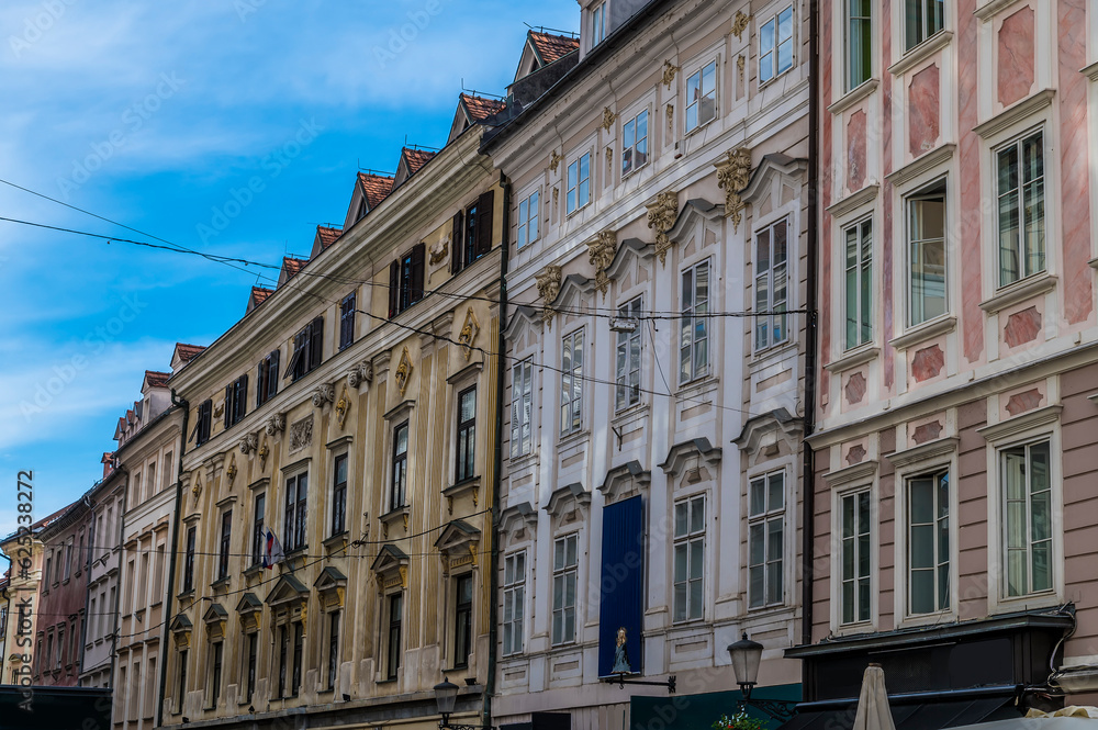 A view of decorative building facades in a street below the castle above Ljubljana, Slovenia in summertime