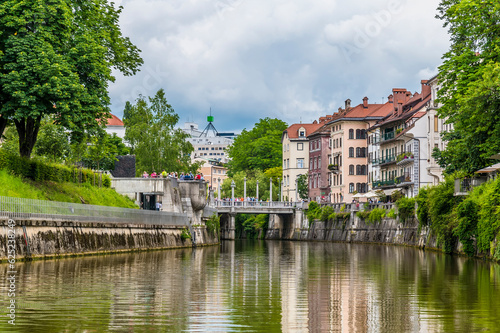 A view on the Ljubljanica River towards the Shoemakers Bridge and the center of Ljubljana, Slovenia in summertime