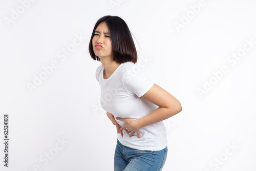 Asian woman is sick Abdominal pain due to menstruation and chronic gastritis isolated on white background