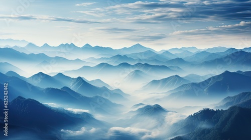  a view of a mountain range from the air with clouds in the sky. generative ai