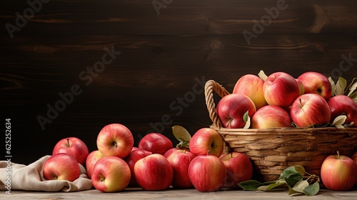 a basket full of red apples next to a pile of green leaves.  generative ai