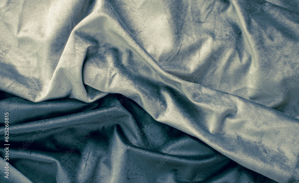 gray blue velvet with pleats, dark and light textile, luxury silk fabric background and copy space gray blue velvet with pleats, dark and light textile, luxury silk fabric background and copy space