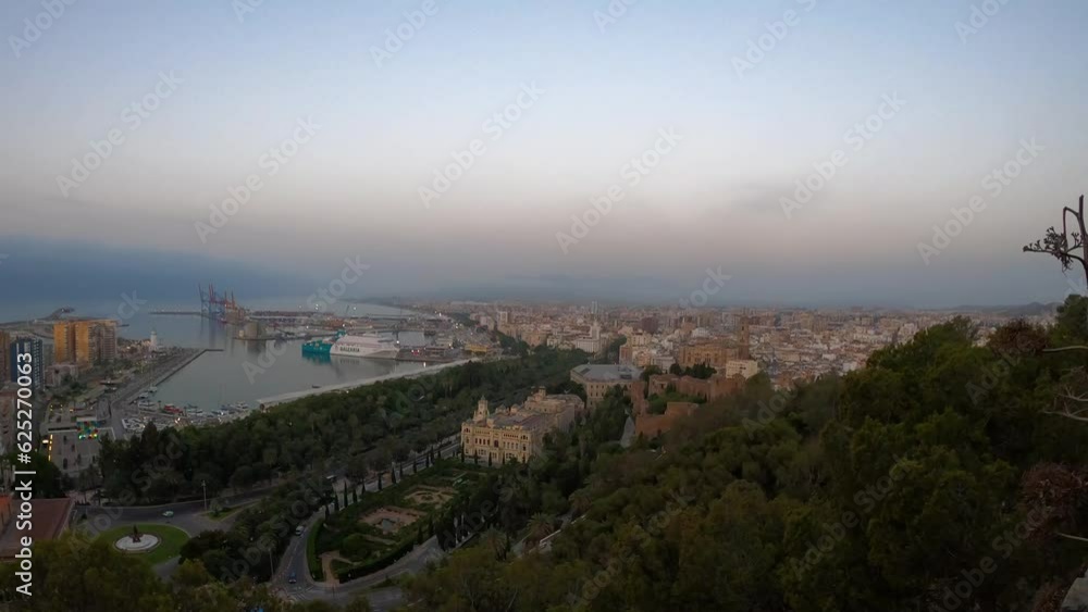 Panoramic aerial view of Malaga in a cloudy summer day in the morning in Malaga, Spain on July 17, 2023 Panoramic aerial view of Malaga in a cloudy summer day in the morning in Malaga, Spain on July 17, 2023