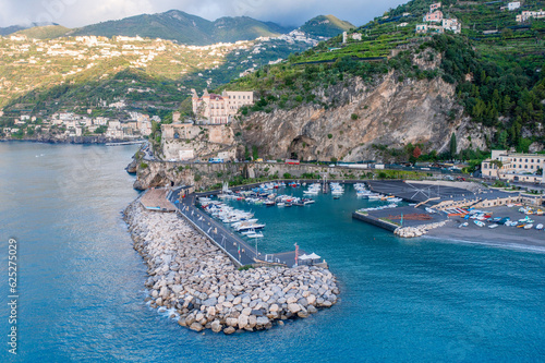 Fototapeta Naklejka Na Ścianę i Meble -  Aerial View of the Harbor in Maiori with Boats Docked Under the Cliffs on the Amalfi Coast in Italy