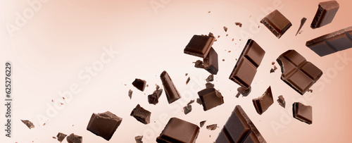 Bild auf Leinwand Broken chocolate bar pieces falling on pink beige background