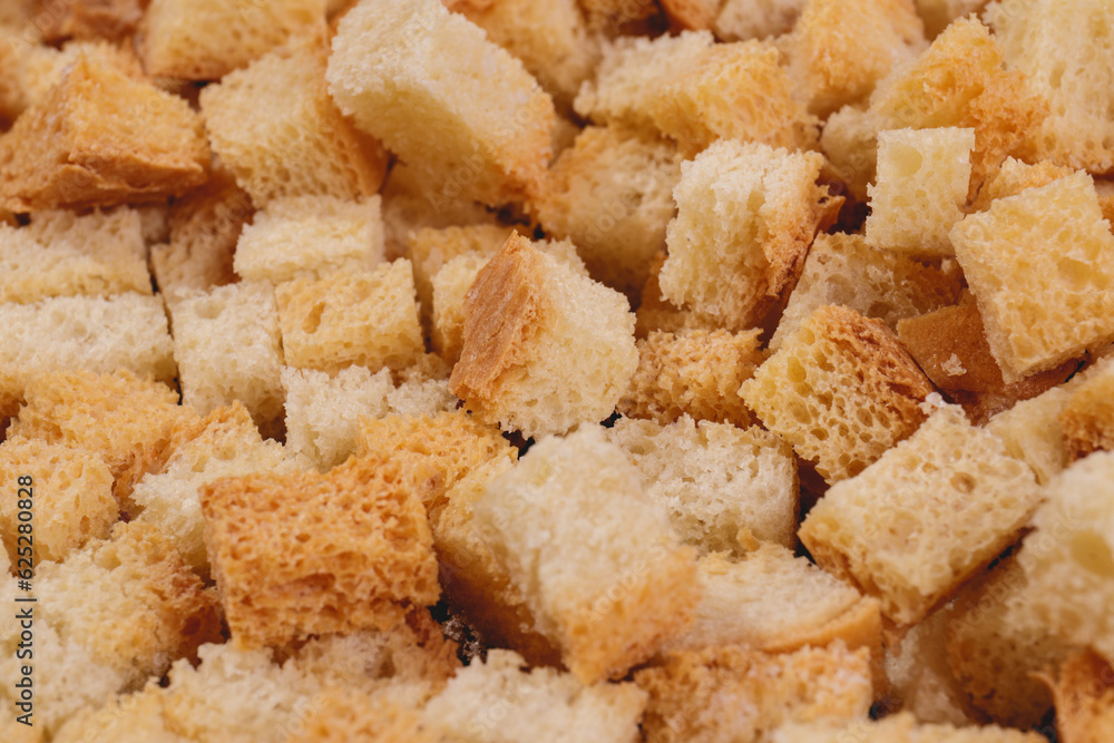 Croutons. Roasted white bread. Close-up of delicious croutons. Macro shot of croutons. Croutons. Roasted white bread. Close-up of delicious croutons. Macro shot of croutons.