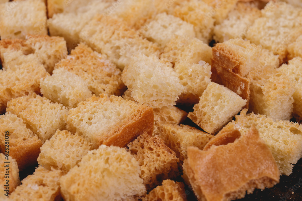 Croutons. Roasted white bread. Close-up of delicious croutons. Macro shot of croutons. Croutons. Roasted white bread. Close-up of delicious croutons. Macro shot of croutons.