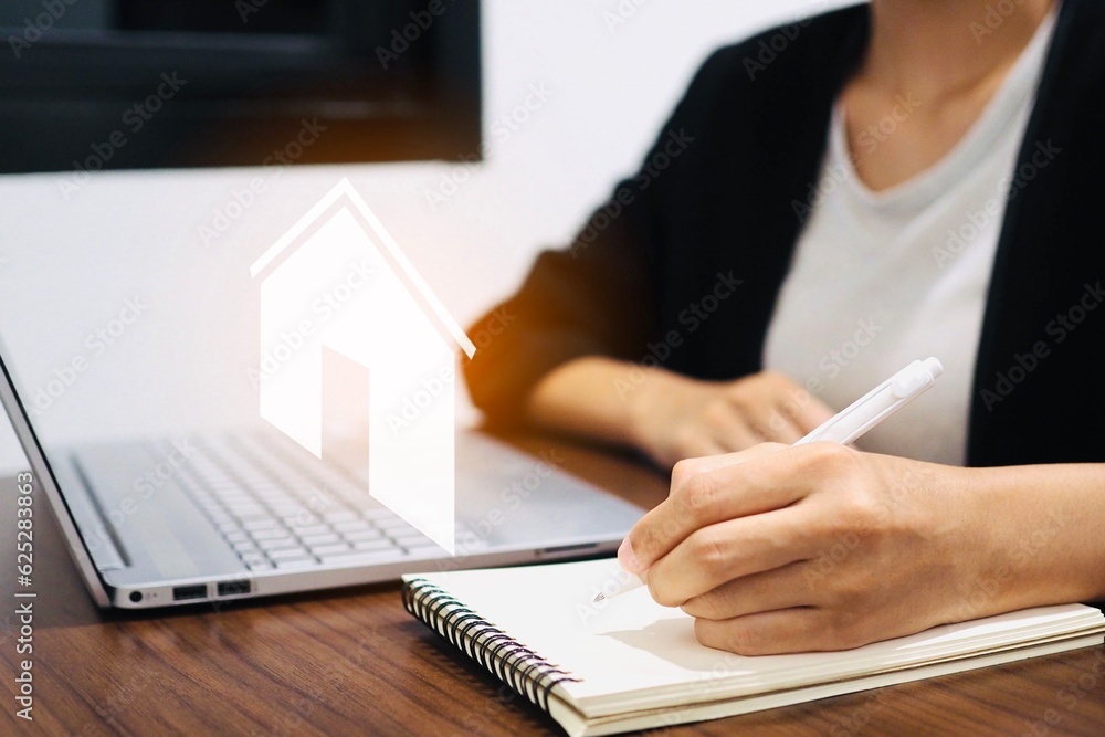 Real estate concept and a house icon Home insurance against impending loss and fire and home tax. Real estate concept and a house icon Home insurance against impending loss and fire and home tax.