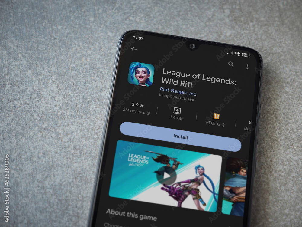 Wild Rift In App Pricing League of Legends - Wild Rift app play store page on smartphone on ...
