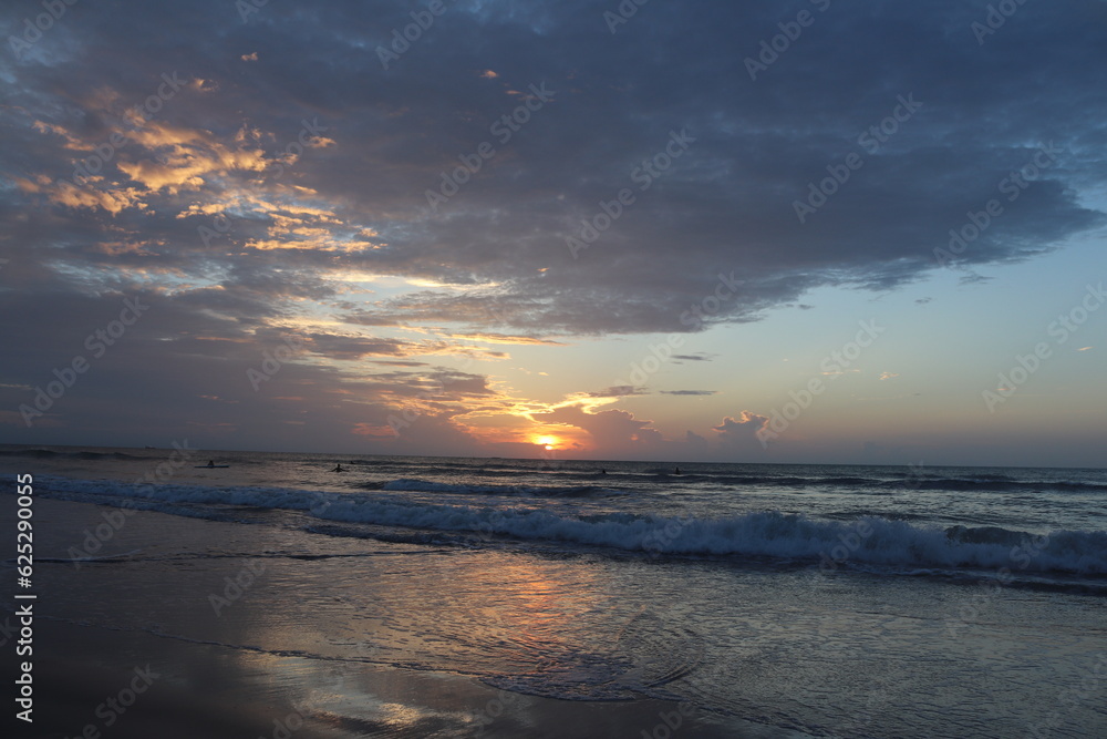 cloudy sunrise at the beach