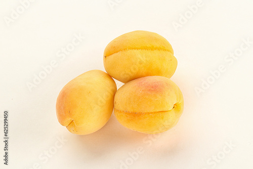 Ripe sweet juicy apricot heap