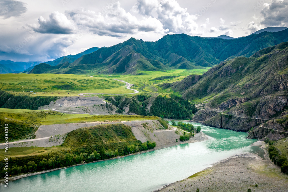 Obraz premium Turquoise Katun River valley in Altai Mountains. Panoramic aerial view along scenic highway Chuysky Tract. Nature landscape near Maly Yaloman, Altai Republic, Siberia, Russia