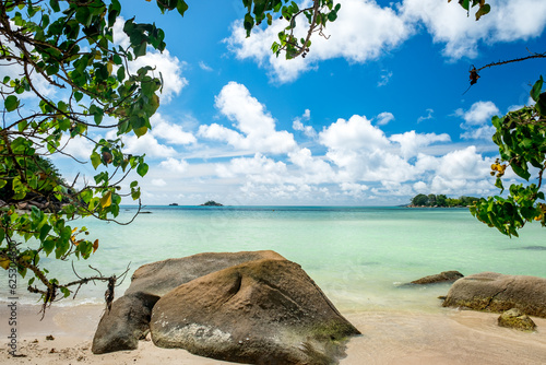 Fototapeta Naklejka Na Ścianę i Meble -  Beautifully shaped granite boulders and a perfect white sand. Most beautiful tropical beaches - Seychelles, Praslin island