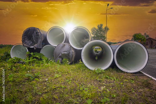 Slika na platnu Construction of plastic pipes of large diameter at the construction site