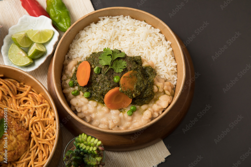 Seco de carne beef stew Food buffet peruvian table Assorted dishes gourmet cuisine Peru traditional Seco de carne beef stew Food buffet peruvian table Assorted dishes gourmet cuisine Peru traditional