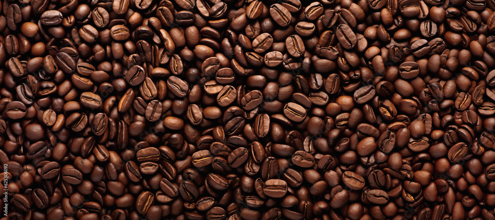 Texture from a lot of roasted coffee beans. Big coffee beans pattern. Texture from a lot of roasted coffee beans. Big coffee beans pattern.