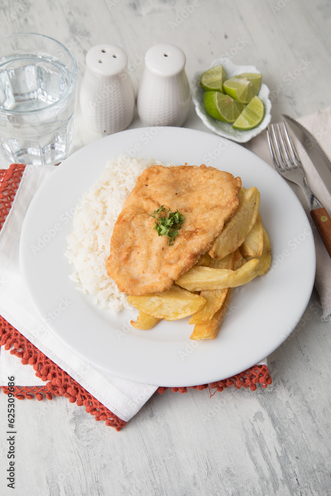 Chicken fillet with french fries Food buffet peruvian table Assorted dishes gourmet cuisine Peru traditional Chicken fillet with french fries Food buffet peruvian table Assorted dishes gourmet cuisine Peru traditional