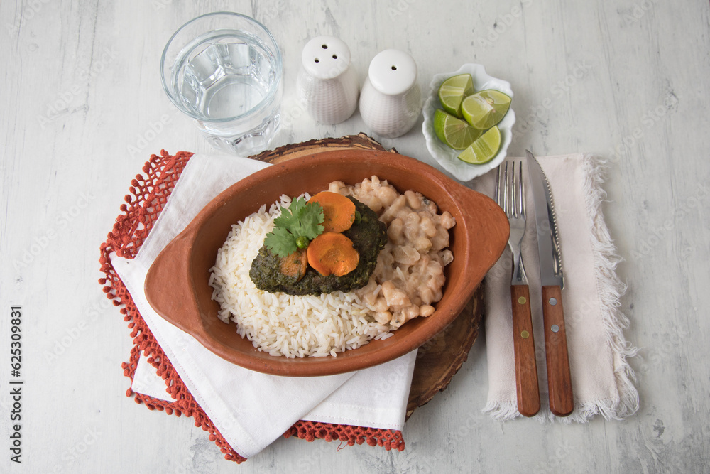 Seco con carne beef stew with white rice and beansFood buffet peruvian table Assorted dishes gourmet cuisine Peru traditional Seco con carne beef stew with white rice and beansFood buffet peruvian table Assorted dishes gourmet cuisine Peru traditional
