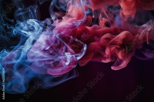 Dramatic smoke and fog in contrasting vivid red  blue  and purple colors. Vivid and intense abstract background or wallpaper. 