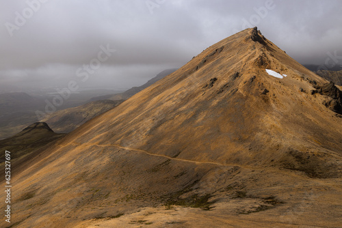 Brown colored Mountain With a view over Reykjavík Iceland 