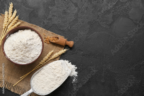 Fresh wheat flour in bowl a...
