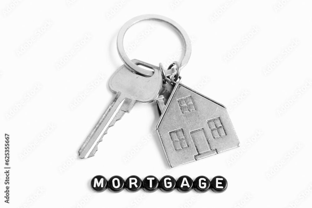 Mortgage, Silver House Key Ring On White Background Mortgage, Silver House Key Ring On White Background