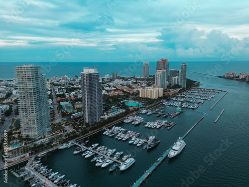 Miami Beach skyline, Florida. Miami Beach city skyline view from aerial drone. Skyscrapers and harbor. Miami Beach waterfront lined with marinas. Miami beach top view from South Point Park. © Volodymyr