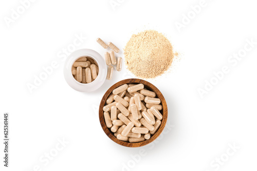 Supplement dietary product. Garlic capsule. garlic powder. Garlic clove isolated on white background. Top view 