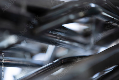 Close up shot of metal pipes in a factory, shallow depth of field photo