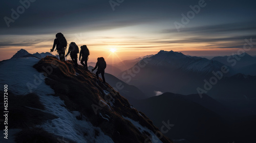 Mountains team climbers on snowy trail  conquered the mountain in winter  Climber on top of a winter view of snow-capped mountain peaks sunshine